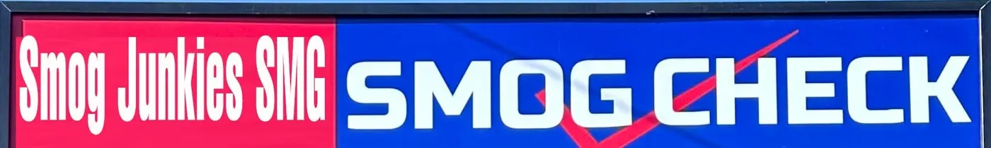 The red and blue Smog Junkies SMG smog check sign